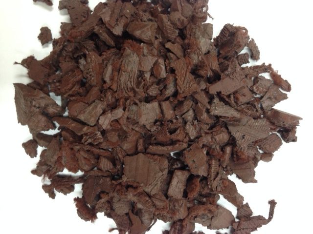 pile of brown colored rubber nugget mulch